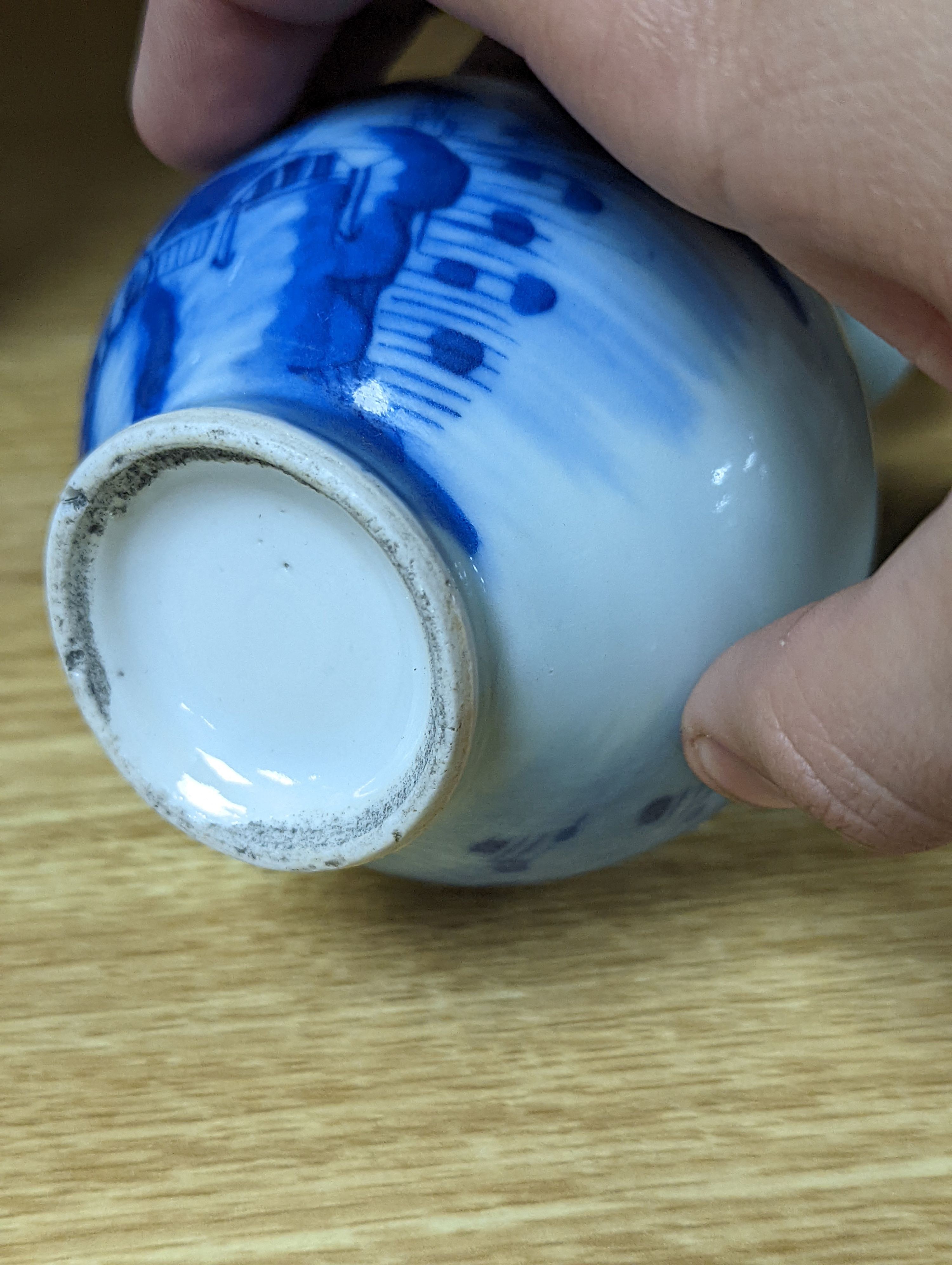 A 19th century Chinese famille rose rice bowl, cover and stand, together with a blue and white dragon jar and similar bottle vase. Largest 18cm